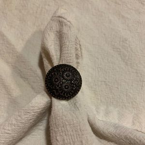 Hand crafted brass ring embossed with flowers